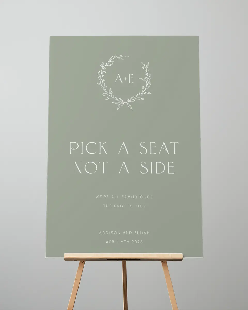 This is a 24" x 36" Pick a Seat Sign called Modern Monogram printed in full color