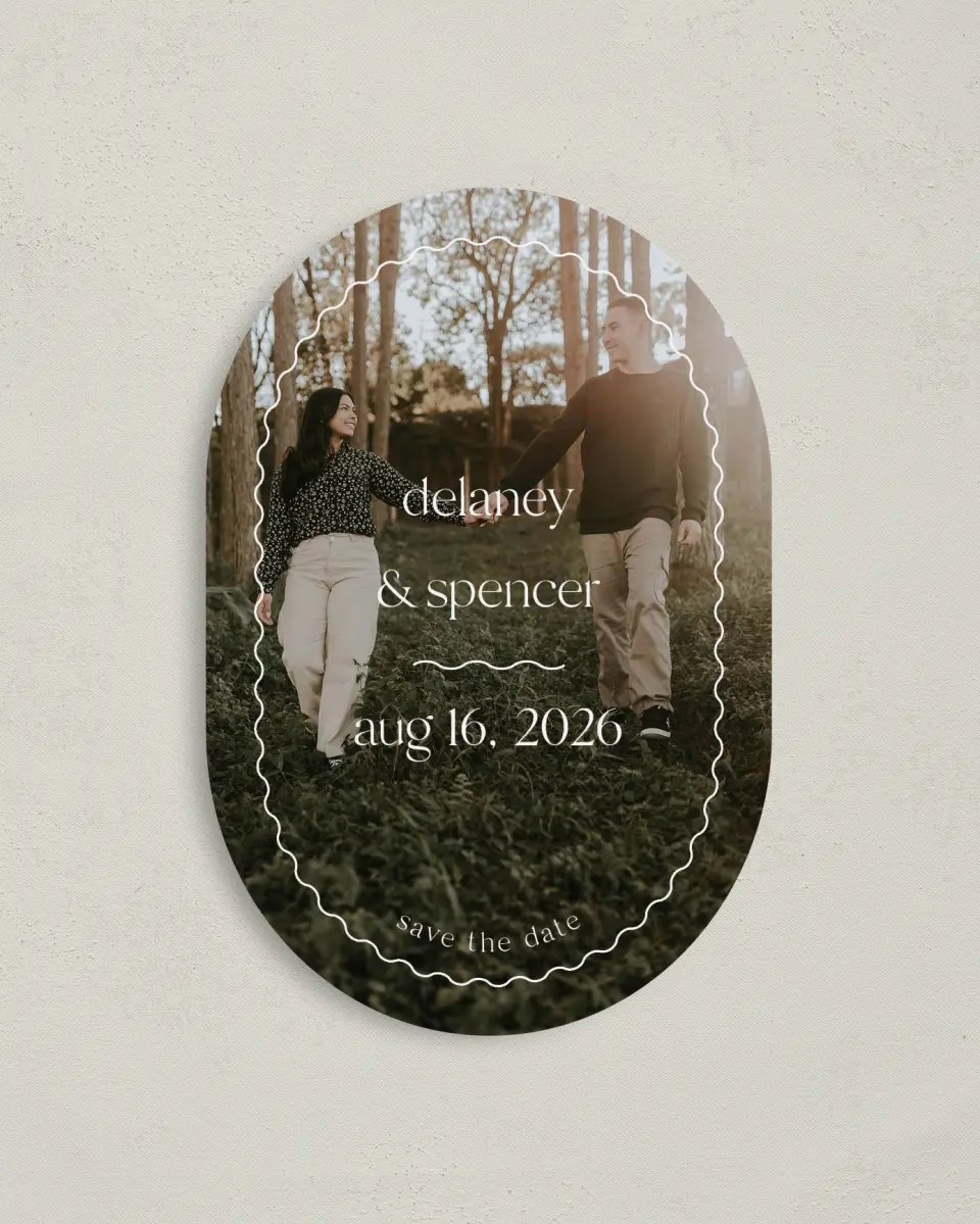 This is a 4" x 6" Oval Save the Dates (Petite) called The Delaney printed in full color with Gold foil on Luxe Satin paper