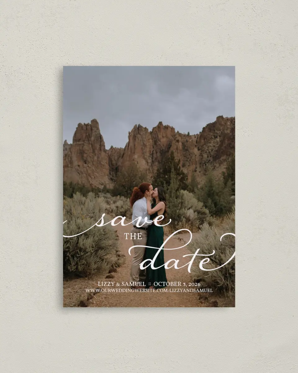 This is a 4" x 5.6" Save the Date Postcard called Scripted Embrace printed in full color on Soft Touch Finish paper