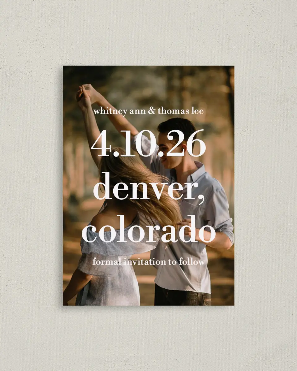 This is a 4" x 5.6" Save the Date Postcard called Date + Place printed in full color with Rose Gold foil on Soft Touch Finish paper