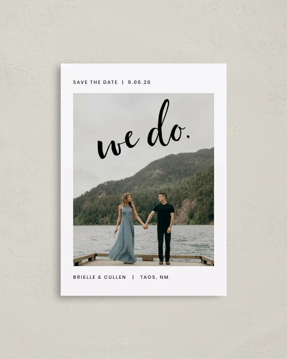 This is a 4" x 5.6" Save the Date Postcard called Written printed in full color with Rose Gold foil on Soft Touch Finish paper