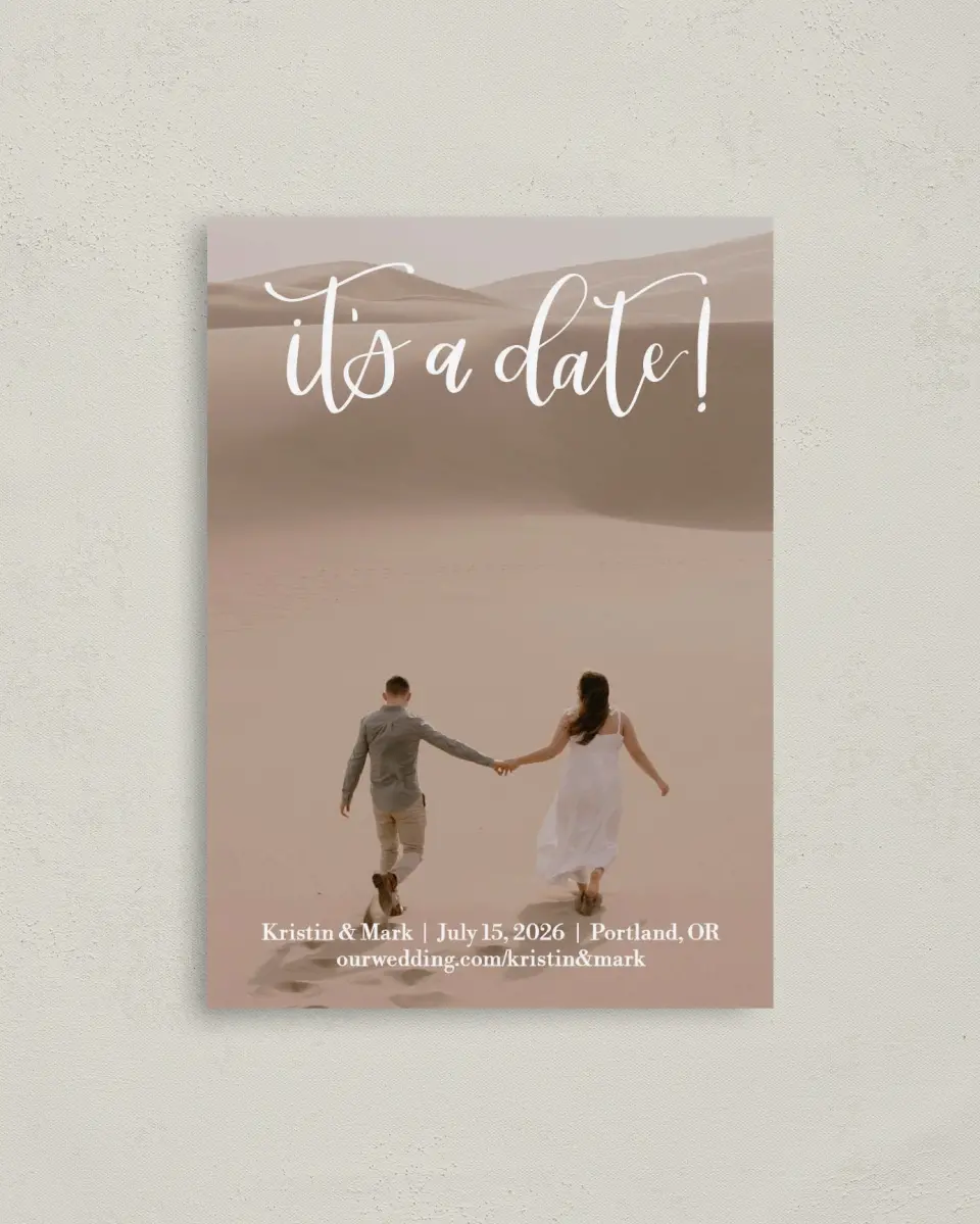 This is a 4" x 5.6" Save the Date Postcard called Make Our Day printed in full color with Rose Gold foil on Soft Touch Finish paper