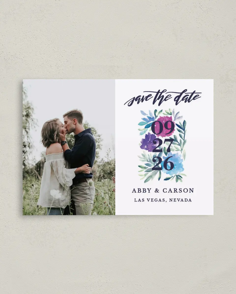 This is a 4" x 5.6" Save the Date Postcard called Kissing Charm printed in full color on Soft Touch Finish paper