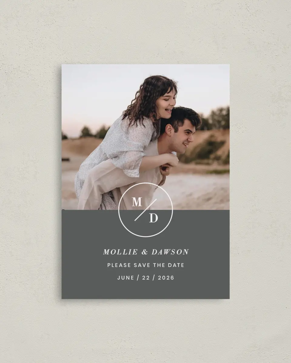 This is a 4" x 5.6" Save the Date Postcard called New Monogram printed in full color with Rose Gold foil on Soft Touch Finish paper