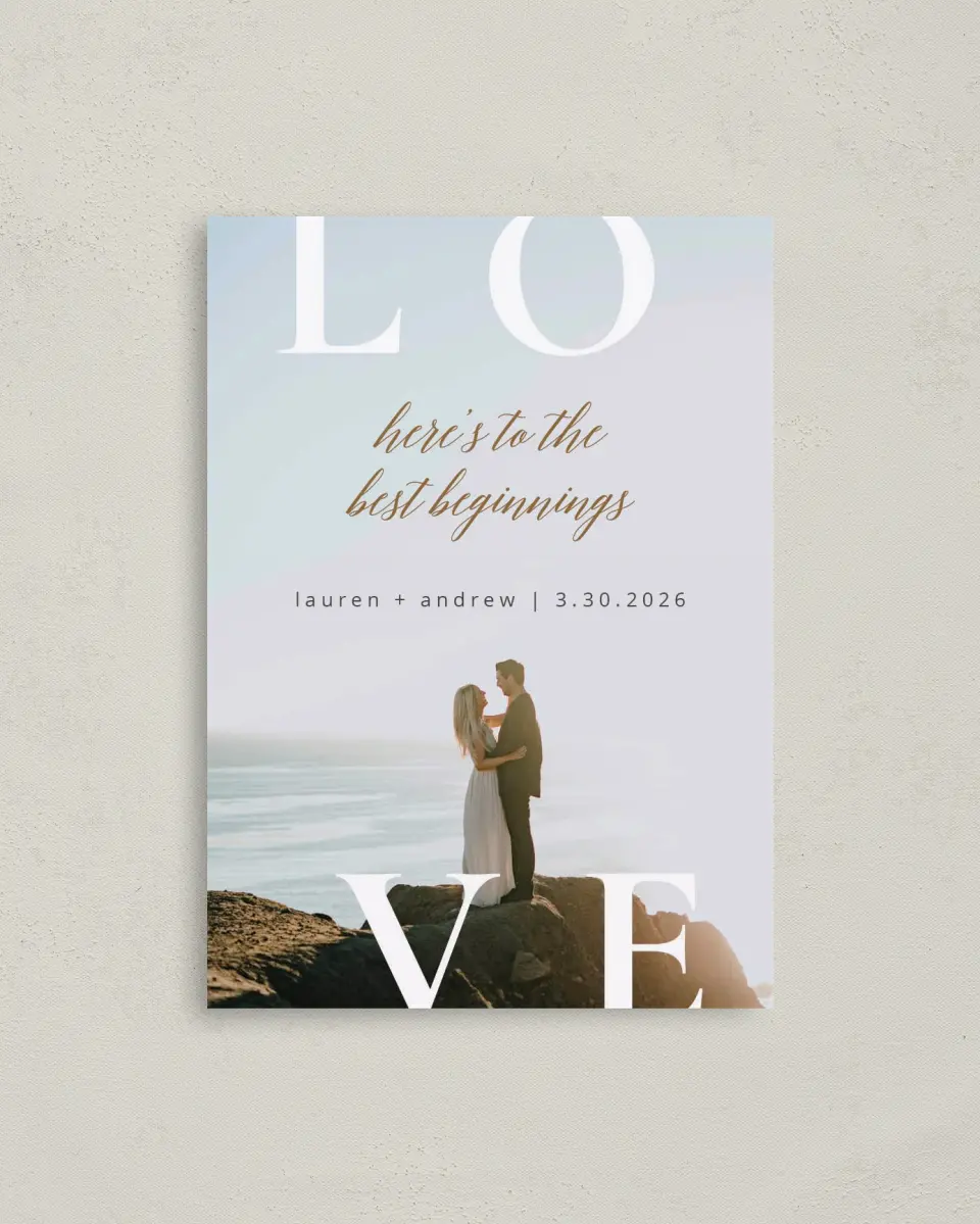 This is a 4" x 5.6" Save the Date Postcard called Beginning of Love printed in full color with Rose Gold foil on Soft Touch Finish paper