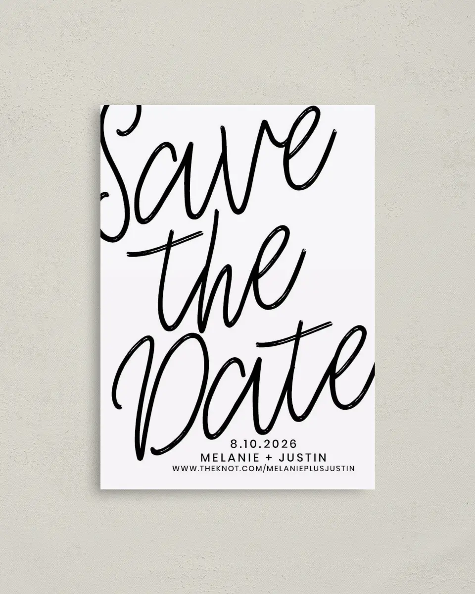 This is a 4" x 5.6" Save the Date Postcard called Modern Mark printed in full color with Gold foil on Soft Touch Finish paper