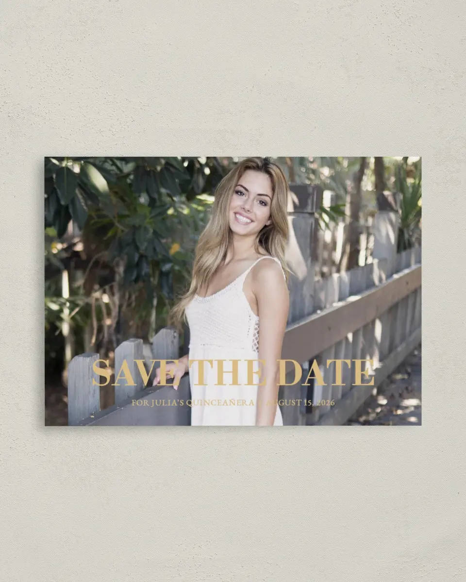 This is a 4" x 5.6" Quinceanera Save the Date called Crowning Moment printed in full color with Gold foil on Soft Touch Finish paper