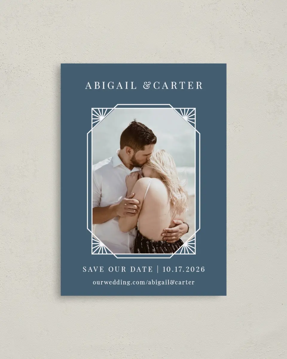 This is a 4" x 5.6" Save the Date Postcard called Mod Deco printed in full color with Rose Gold foil on Soft Touch Finish paper