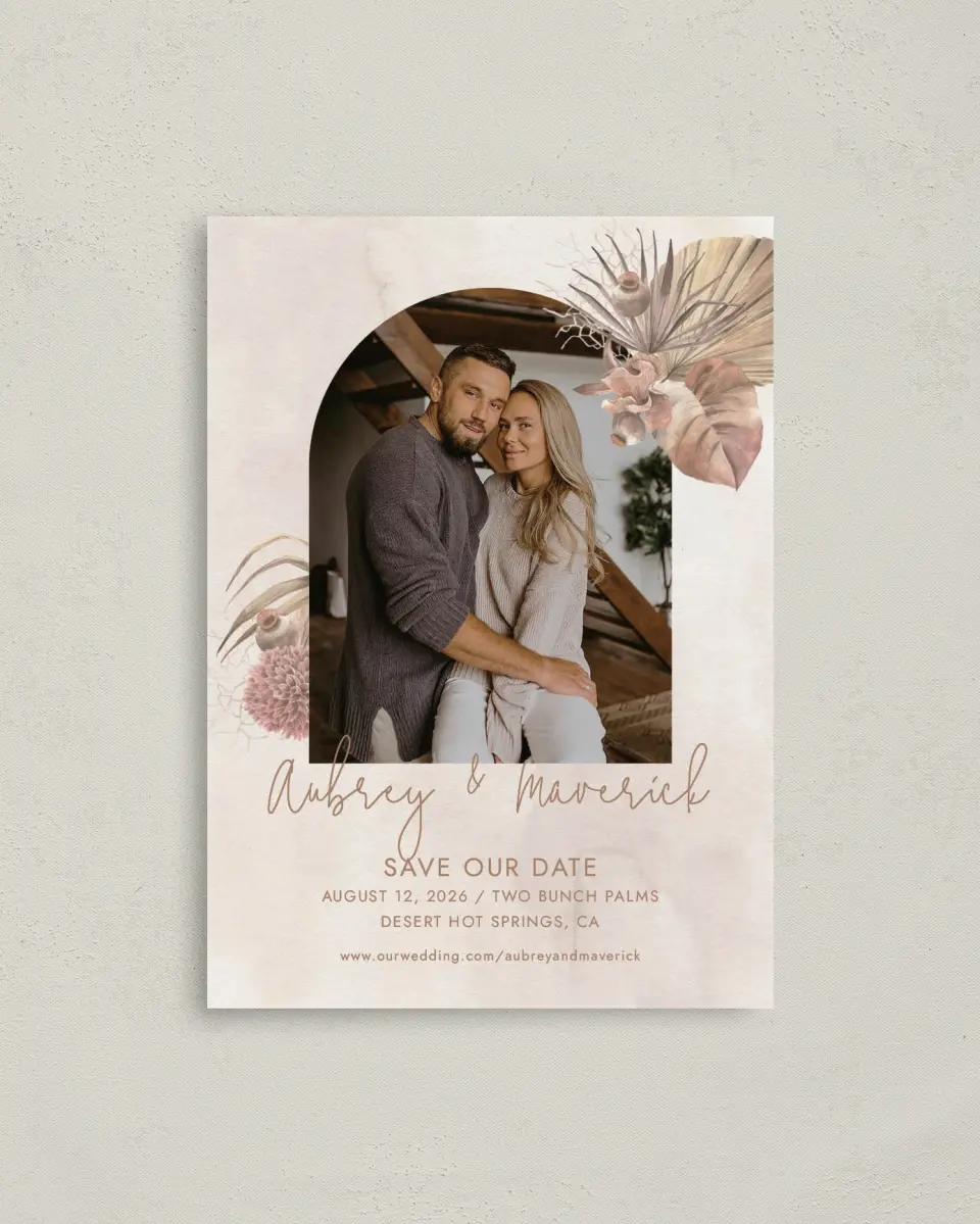 This is a 4" x 5.6" Save the Date Postcard called Boho Blooms printed in full color with Rose Gold foil on Soft Touch Finish paper
