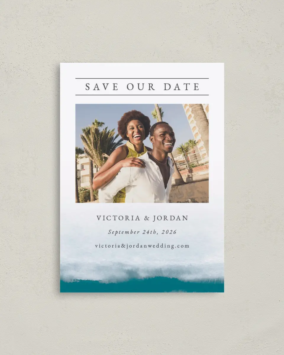This is a 4" x 5.6" Save the Date Postcard called Shore Impression printed in full color with Rose Gold foil on Soft Touch Finish paper