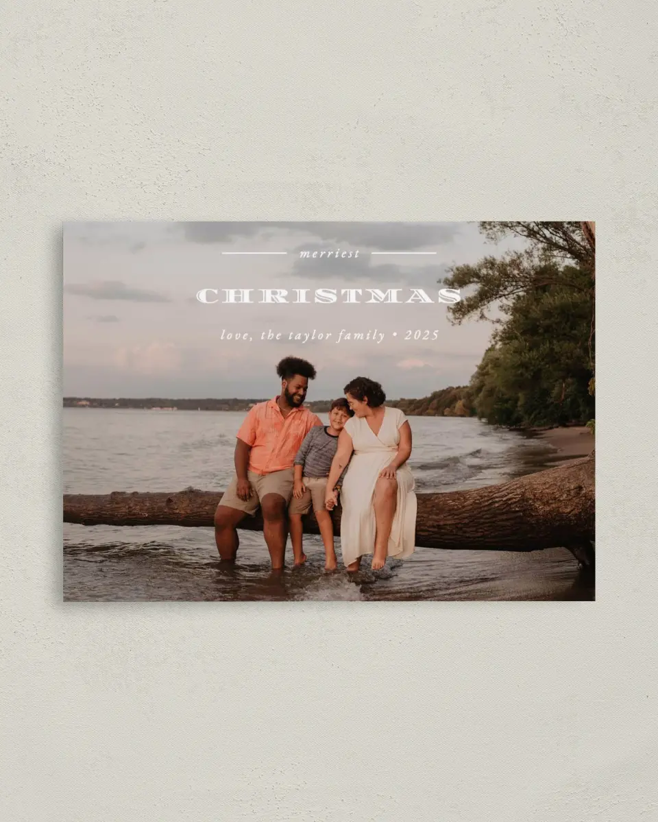 This is a 4" x 5.6" Christmas Card called Merriest Christmas printed in full color with Rose Gold foil on Soft Suede (coated) paper
