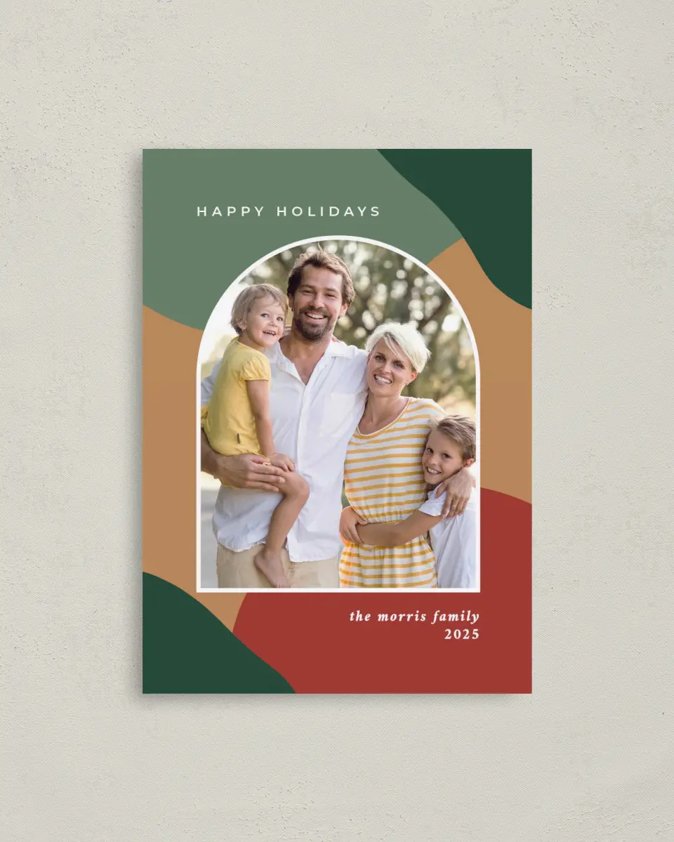 This is a 4" x 5.6" Christmas Card called Joyus Arch printed in full color with Rose Gold foil on Soft Suede (coated) paper