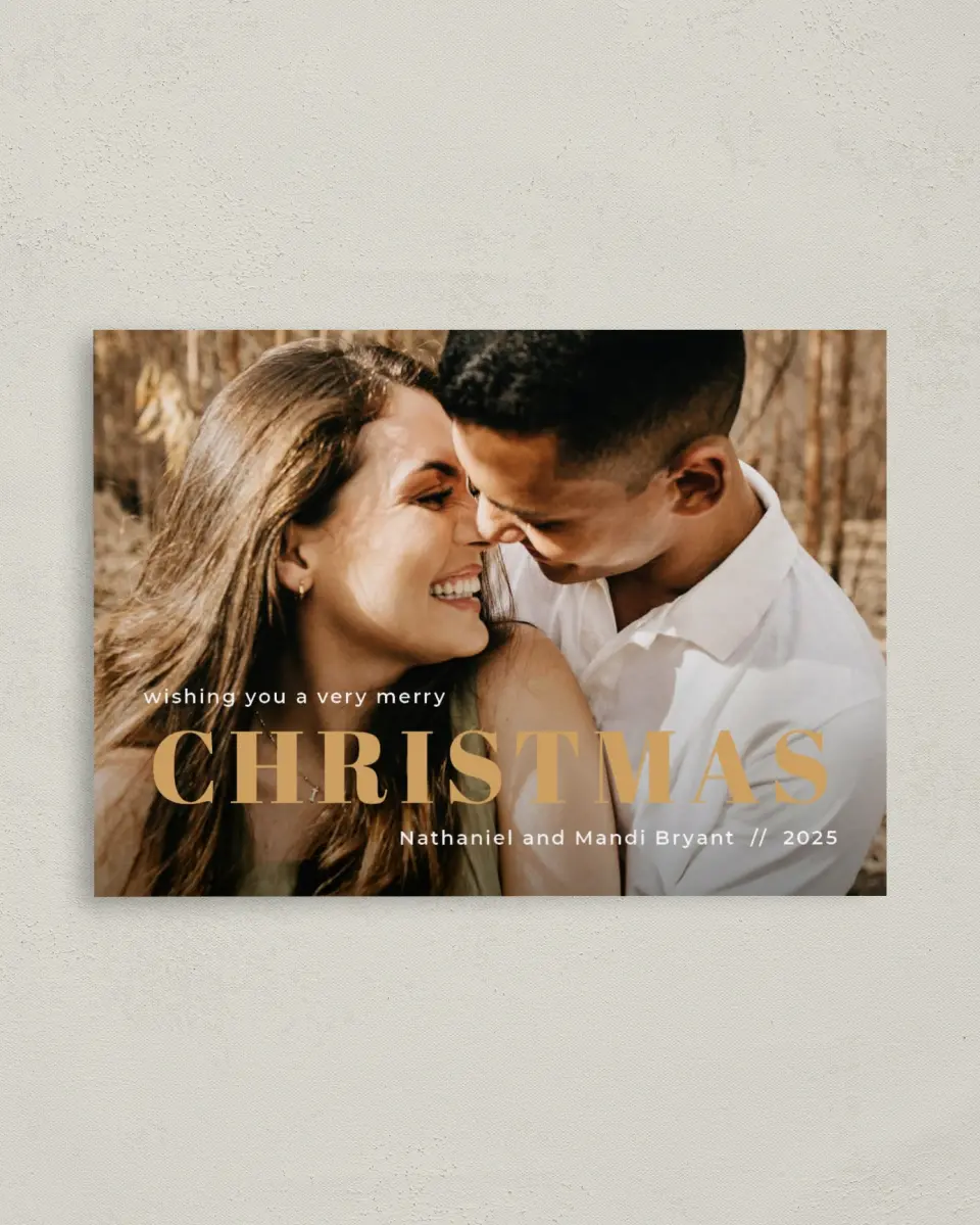 This is a 4" x 5.6" Christmas Card called Spacious Christmas printed in full color with Rose Gold foil on Soft Suede (coated) paper