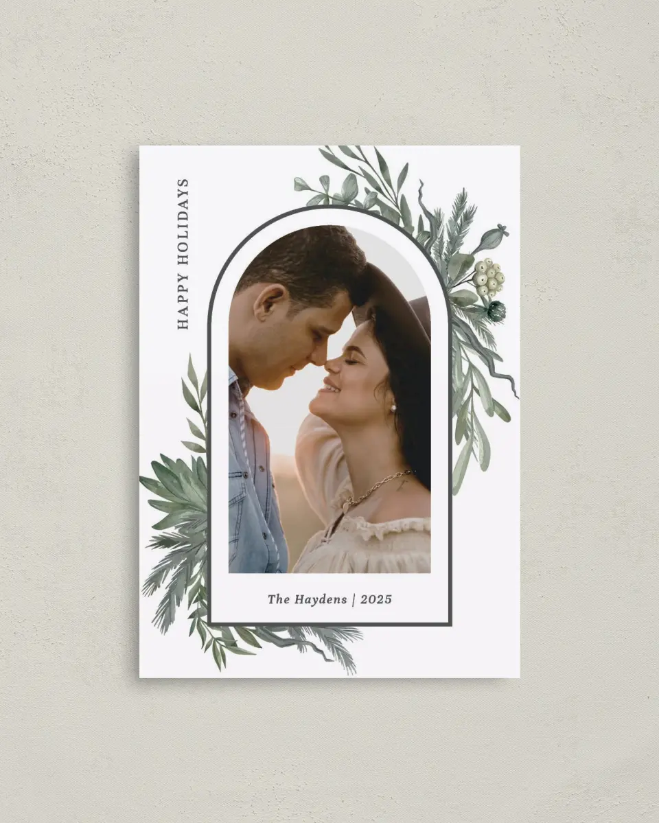 This is a 4" x 5.6" Christmas Card called Greenery Greetings printed in full color with Rose Gold foil on Soft Suede (coated) paper