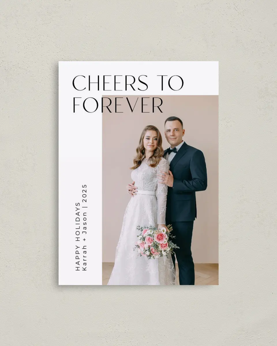 This is a 4" x 5.6" Christmas Card called Cheers to Forever printed in full color with Rose Gold foil on Soft Suede (coated) paper