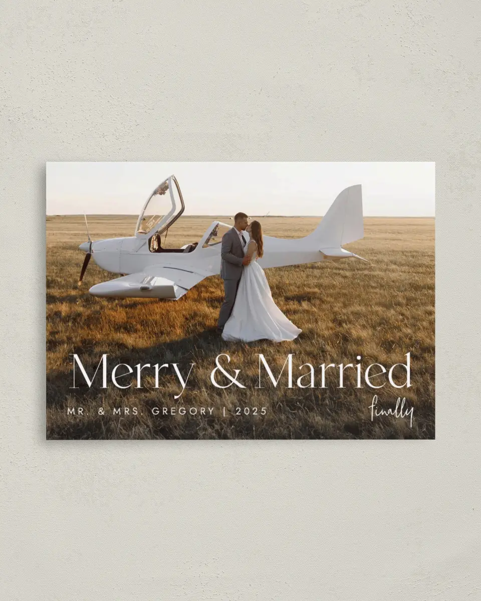 This is a 4" x 5.6" Christmas Card called Finally Married printed in full color with Rose Gold foil on Soft Suede (coated) paper
