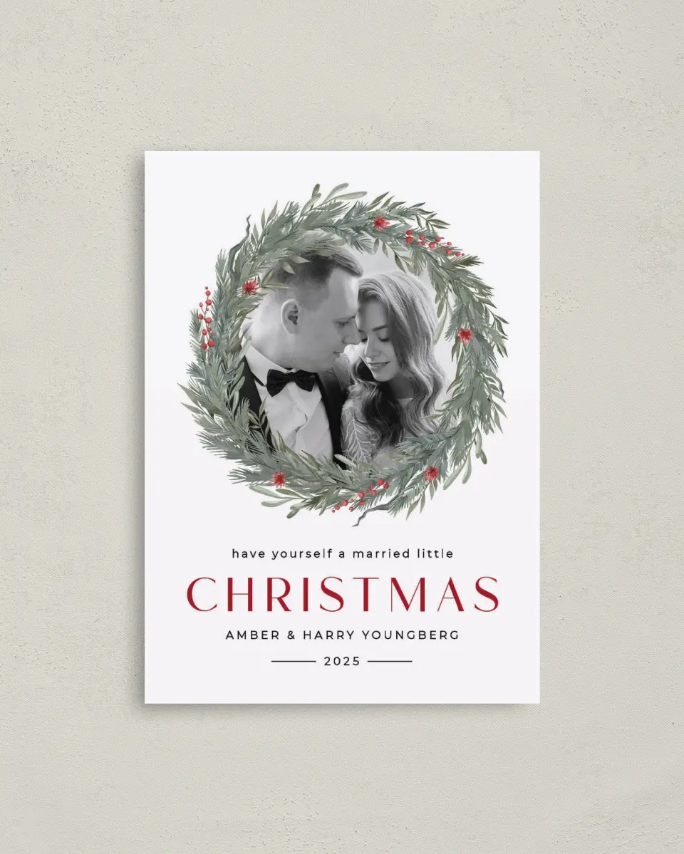 This is a 4" x 5.6" Christmas Card called Delicate Boughs printed in full color with Rose Gold foil on Soft Suede (coated) paper