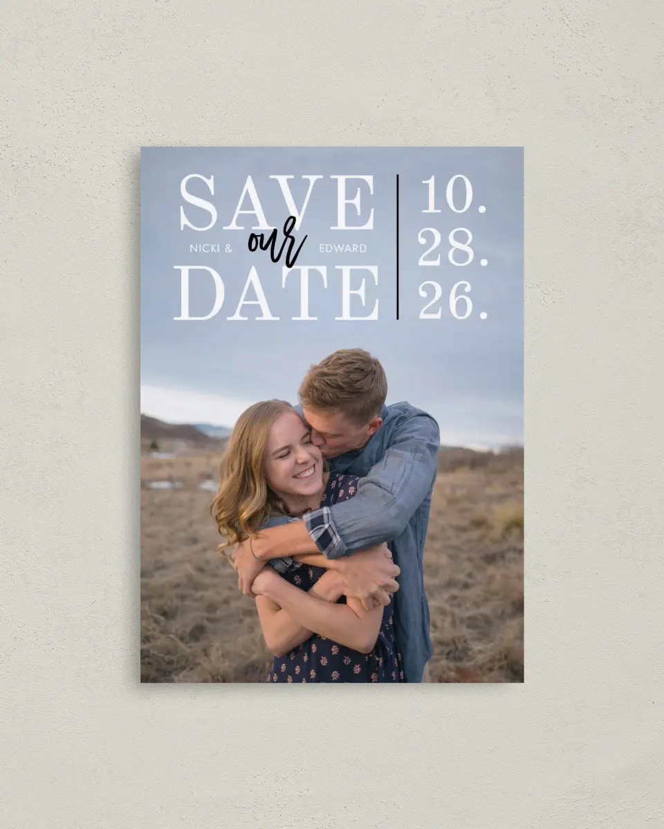 This is a 4" x 5.6" Save the Date Postcard called Intertwined Delight printed in full color with Rose Gold foil on Soft Touch Finish paper