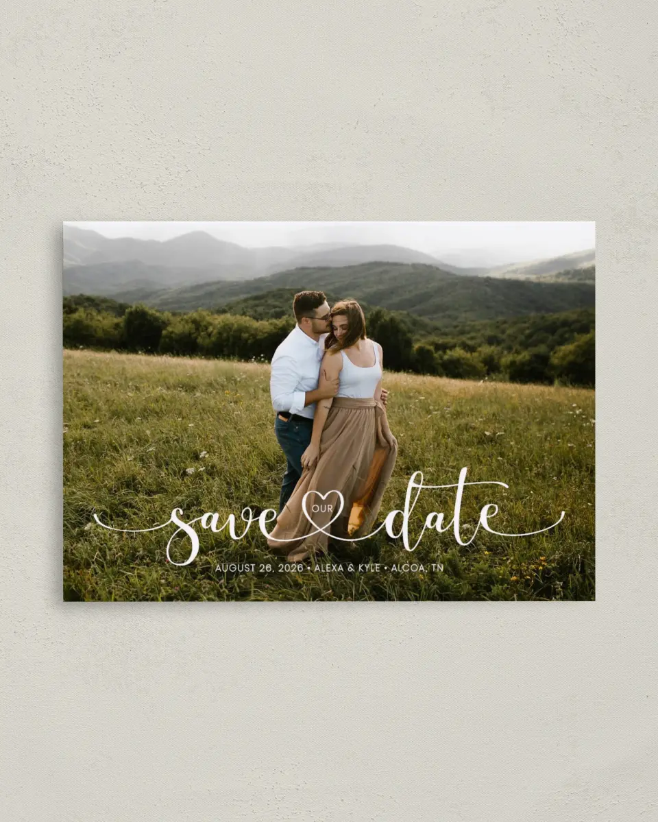 This is a 4" x 5.6" Save the Date Postcard called Entwined Heart printed in full color on Soft Touch Finish paper