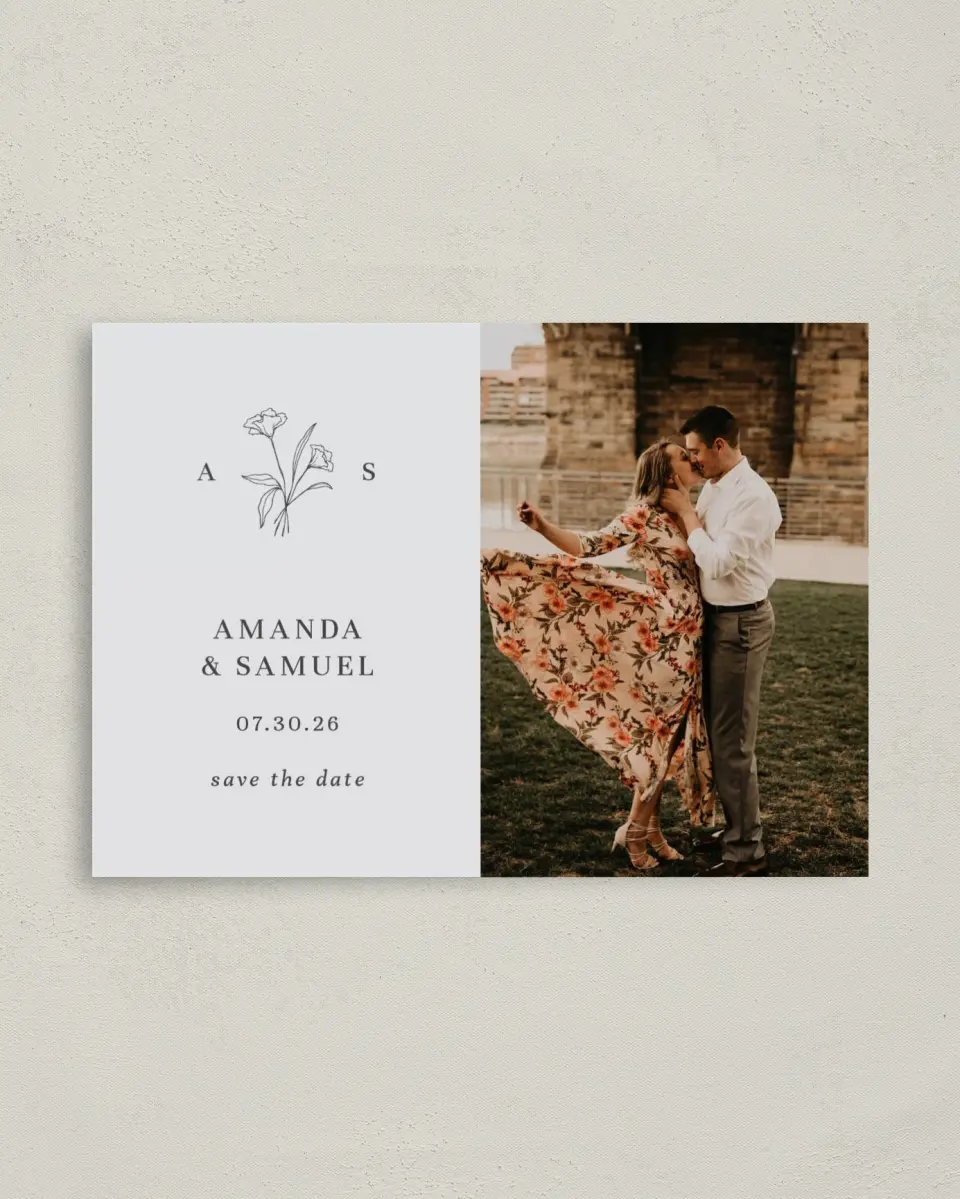 This is a 4" x 5.6" Save the Date Postcard called Monogram Bloom printed in full color on Soft Touch Finish paper