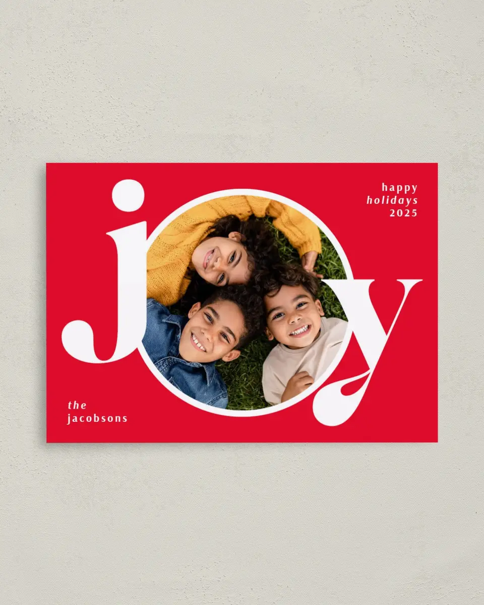 This is a 4" x 5.6" Christmas Card called Big Bold Joy printed in full color with Rose Gold foil on Soft Suede (coated) paper