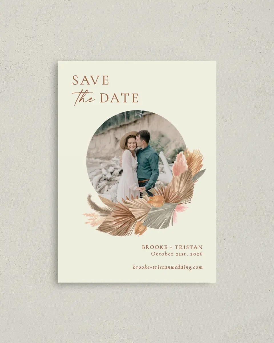 This is a 4" x 5.6" Save the Date Postcard called Sandy Fronds printed in full color with Rose Gold foil on Soft Touch Finish paper