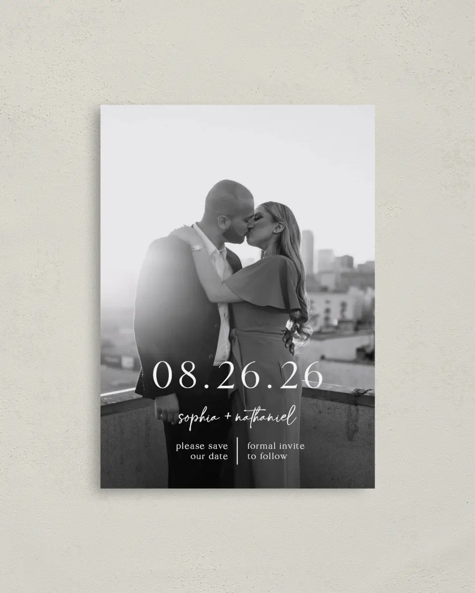This is a 4" x 5.6" Save the Date Postcard called The Sophia printed in full color with Rose Gold foil on Soft Touch Finish paper