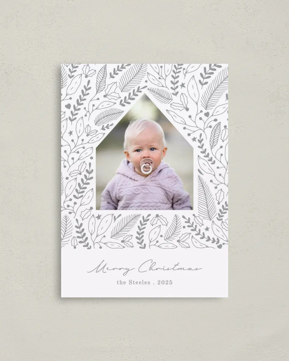 This is a 4" x 5.6" Christmas Card called Holiday House printed in full color with Rose Gold foil on Soft Suede (coated) paper