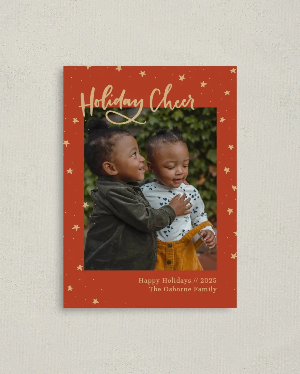 This is a 4" x 5.6" Christmas Card called Shining Stars printed in full color with Rose Gold foil on Soft Suede (coated) paper