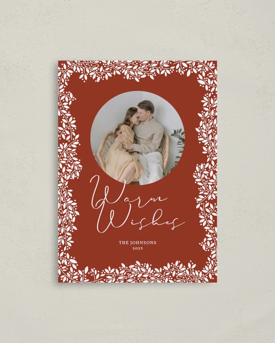 This is a 4" x 5.6" Christmas Card called Botanical Wishes printed in full color with Rose Gold foil on Soft Suede (coated) paper