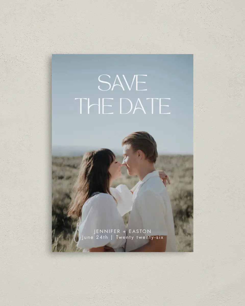 This is a 4" x 5.6" Save the Date Postcard called Soft Style printed in full color with Gold foil on Soft Touch Finish paper