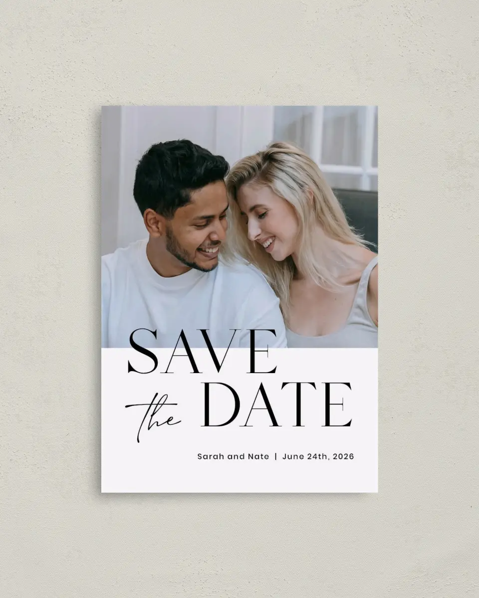 This is a 4" x 5.6" Save the Date Postcard called Alluring Type printed in full color with Rose Gold foil on Soft Touch Finish paper