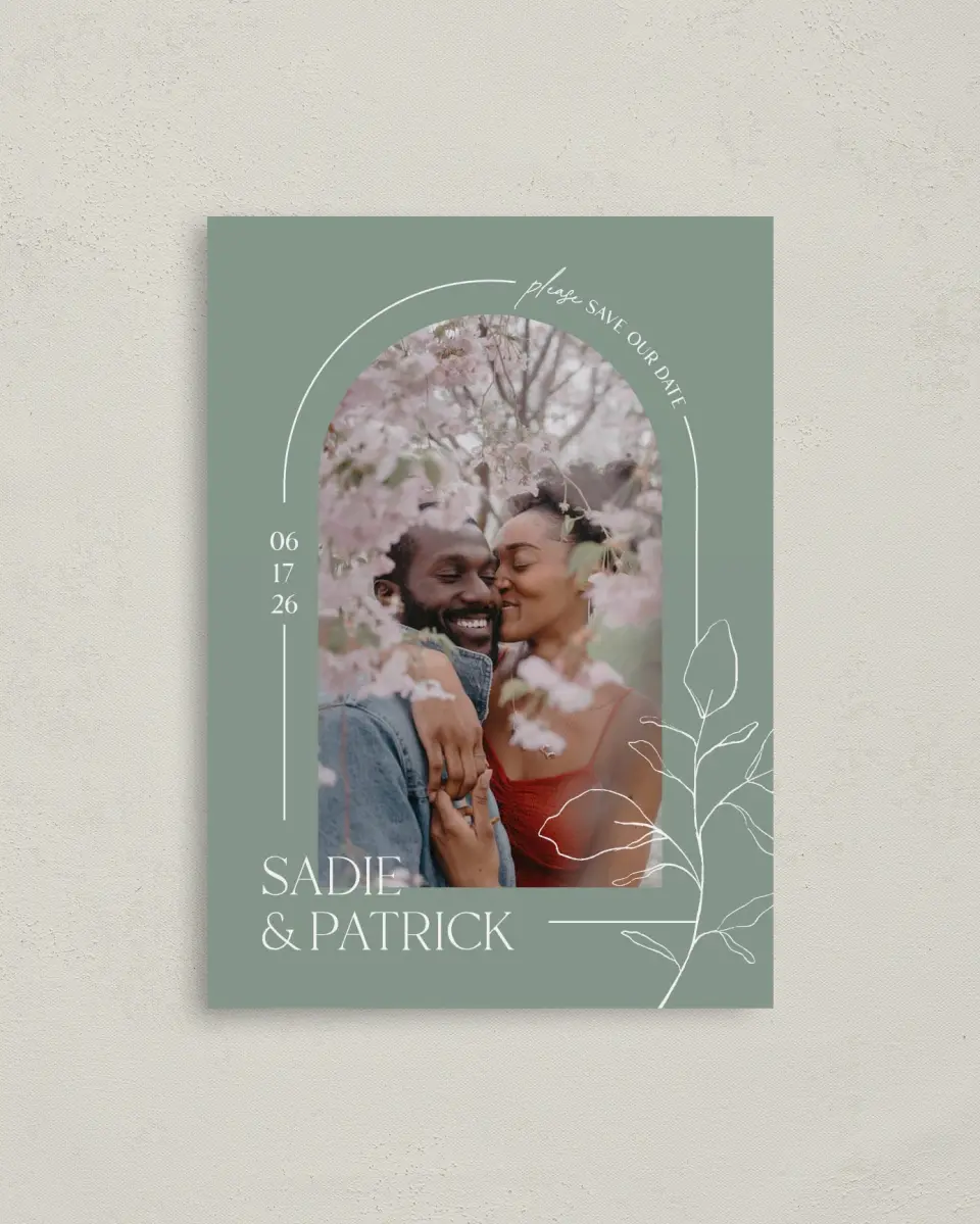 This is a 4" x 5.6" Save the Date Postcard called The Sadie printed in full color with Rose Gold foil on Soft Touch Finish paper