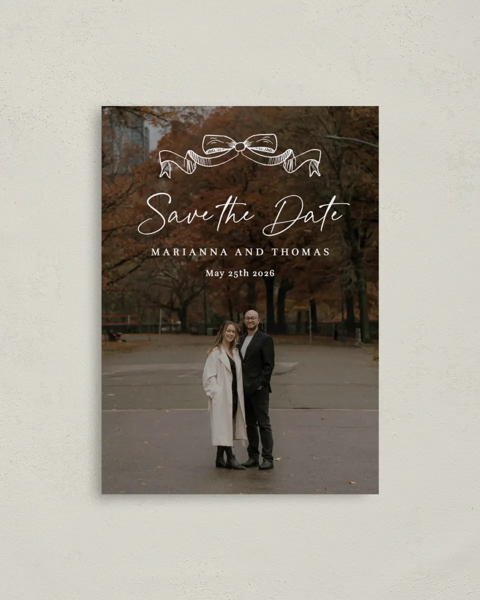 This is a 4" x 5.6" Save the Date Postcard called Ribbon Romance printed in full color on Soft Touch Finish paper