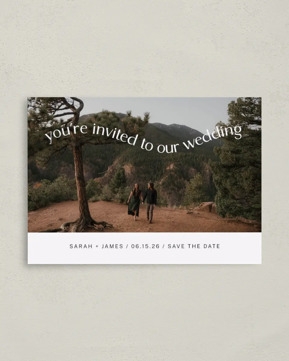 This is a 4" x 5.6" Save the Date Postcard called Winding Wed printed in full color with Gold foil on Soft Touch Finish paper