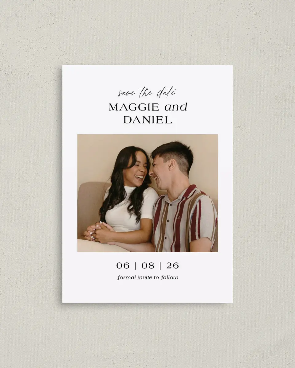 This is a 4" x 5.6" Save the Date Postcard called Silly Romance printed in full color with Rose Gold foil on Soft Touch Finish paper