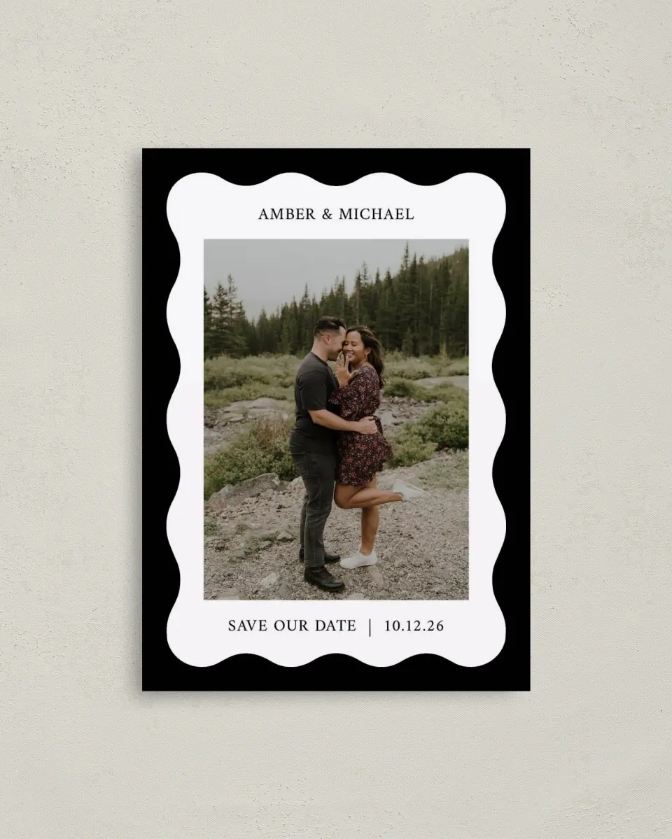 This is a 4" x 5.6" Save the Date Postcard called The Amber printed in full color with Rose Gold foil on Soft Touch Finish paper