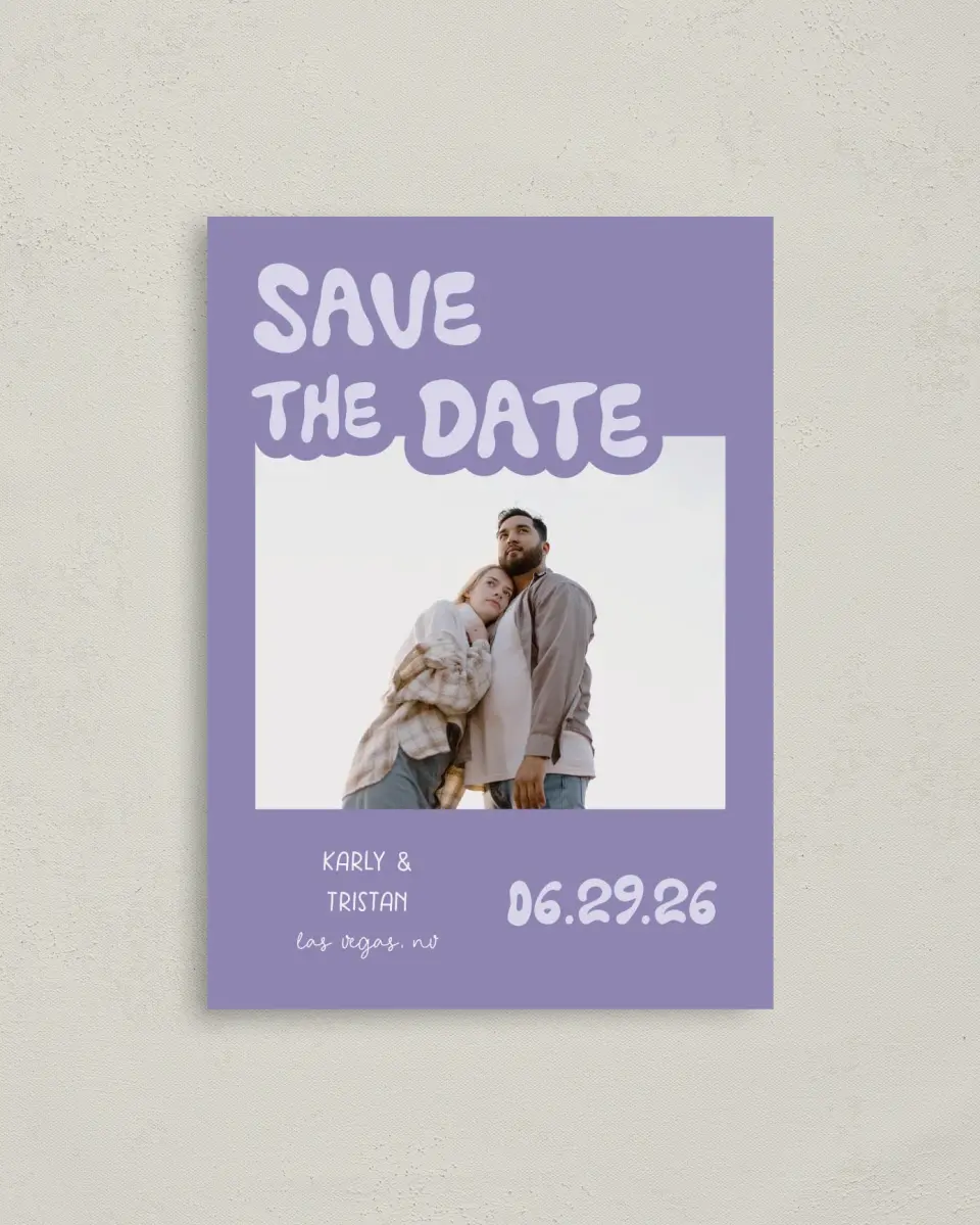 This is a 4" x 5.6" Save the Date Postcard called The Karly printed in full color with Rose Gold foil on Soft Touch Finish paper