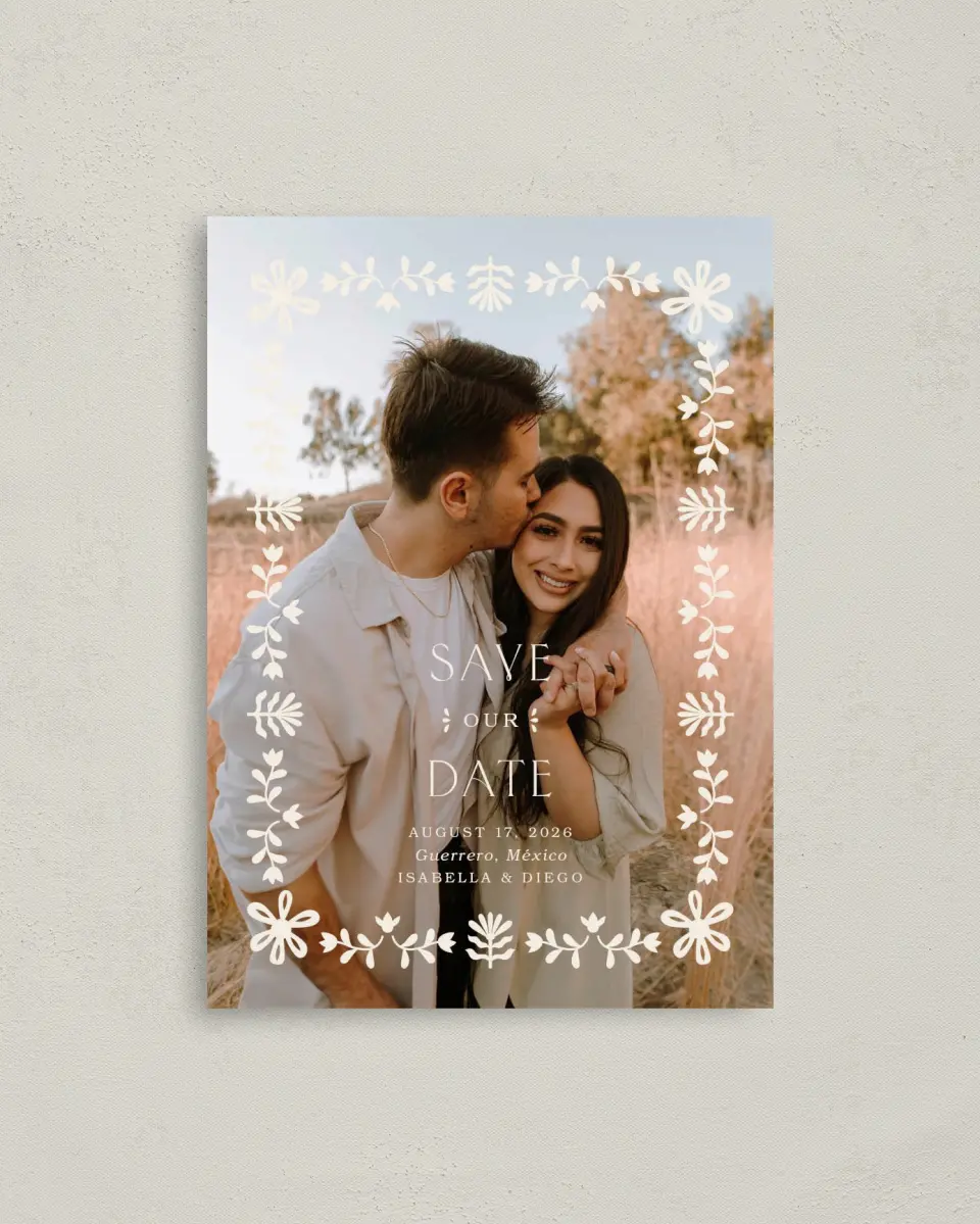 This is a 4" x 5.6" Save the Date Postcard called Folk Fiesta printed in full color with Rose Gold foil on Soft Touch Finish paper