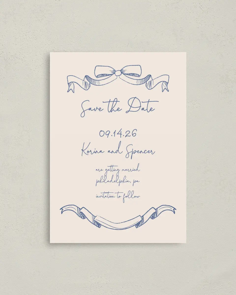 This is a 4" x 5.6" Save the Date Postcard called Sketched Bow printed in full color on Soft Touch Finish paper