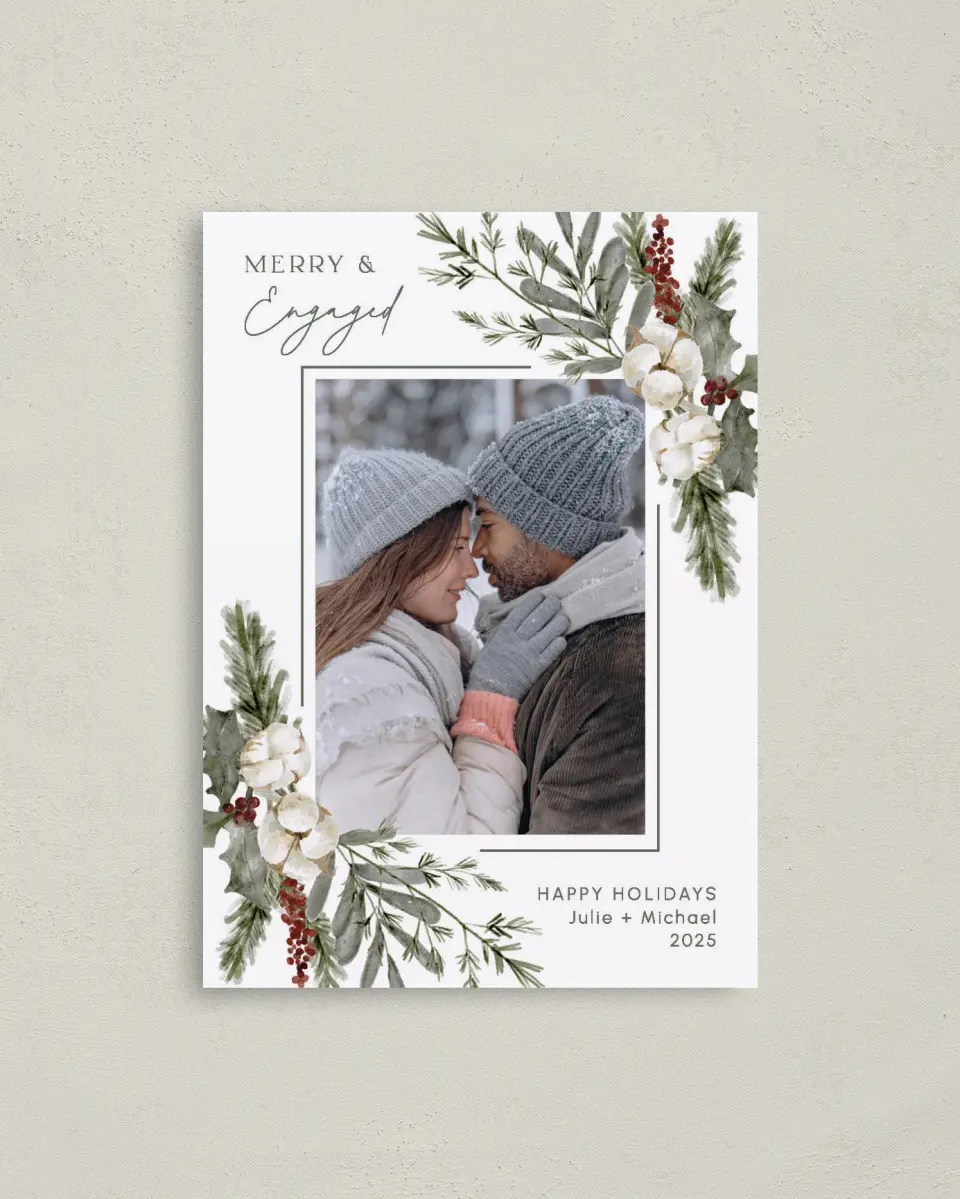 This is a 4" x 5.6" Christmas Card called The More The Merrier printed in full color with Rose Gold foil on Soft Suede (coated) paper