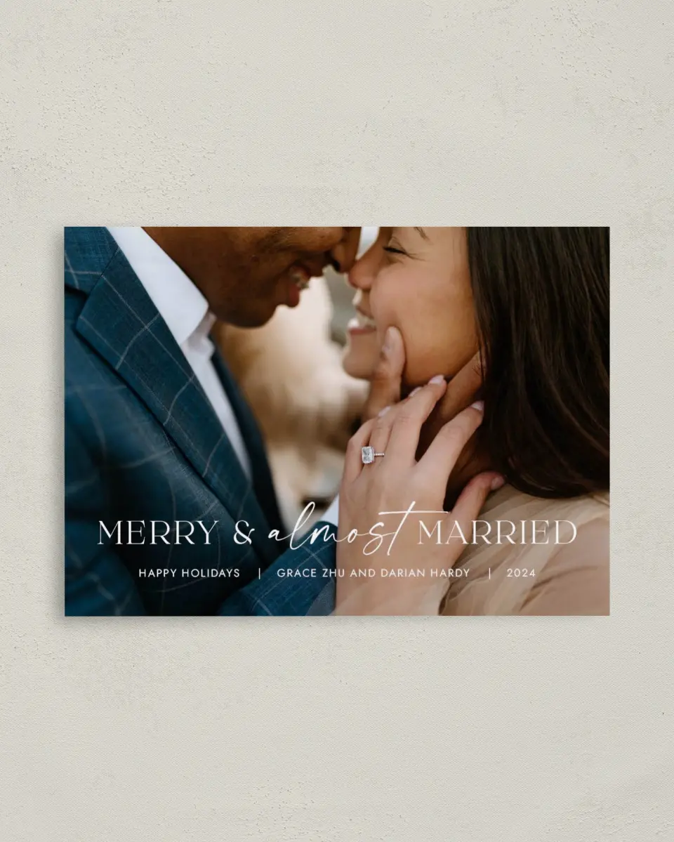 This is a 4" x 5.6" Christmas Postcard called Almost Married printed in full color with Gold foil on Soft Suede (coated) paper