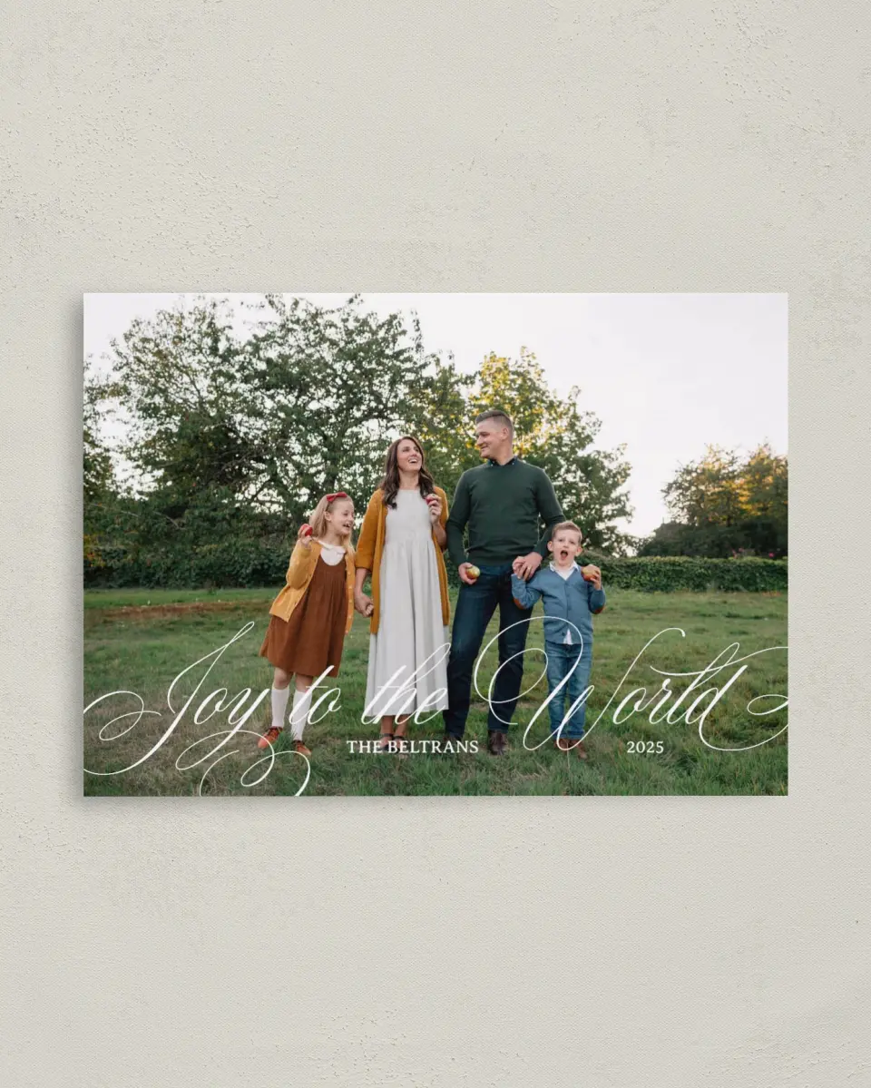 This is a 4" x 5.6" Christmas Card called Bountiful Joy printed in full color with Rose Gold foil on Soft Suede (coated) paper