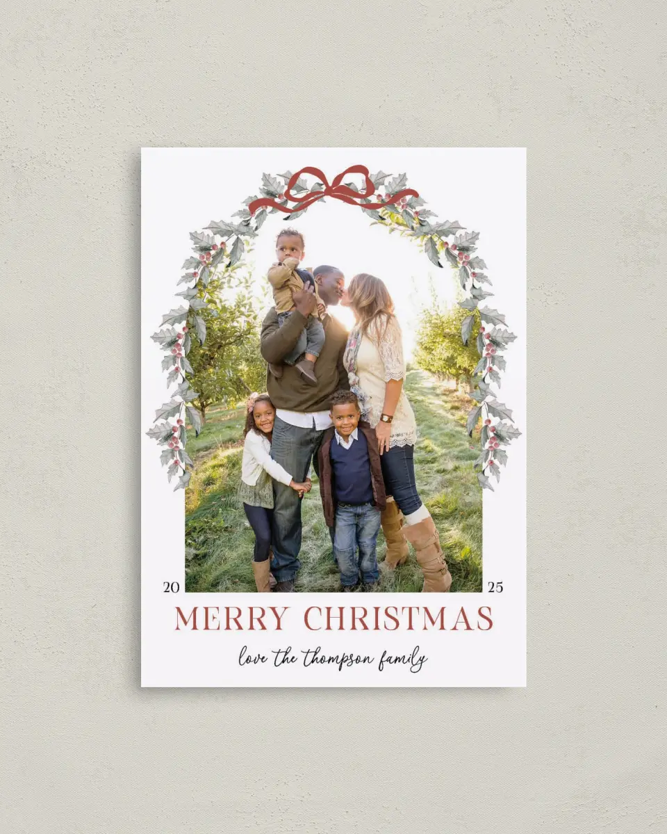 This is a 4" x 5.6" Christmas Card called Holly & Mistletoe Magic printed in full color with Rose Gold foil on Soft Suede (coated) paper