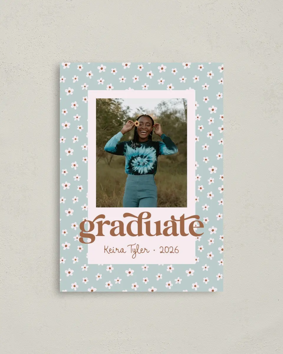 This is a 4" x 5.6" Graduation Announcement Postcard called Demure Daisies printed in full color with Silver foil on Soft Touch Finish paper