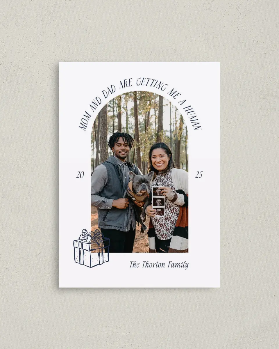 This is a 4" x 5.6" Christmas Card called New Addition printed in full color with Rose Gold foil on Soft Suede (coated) paper