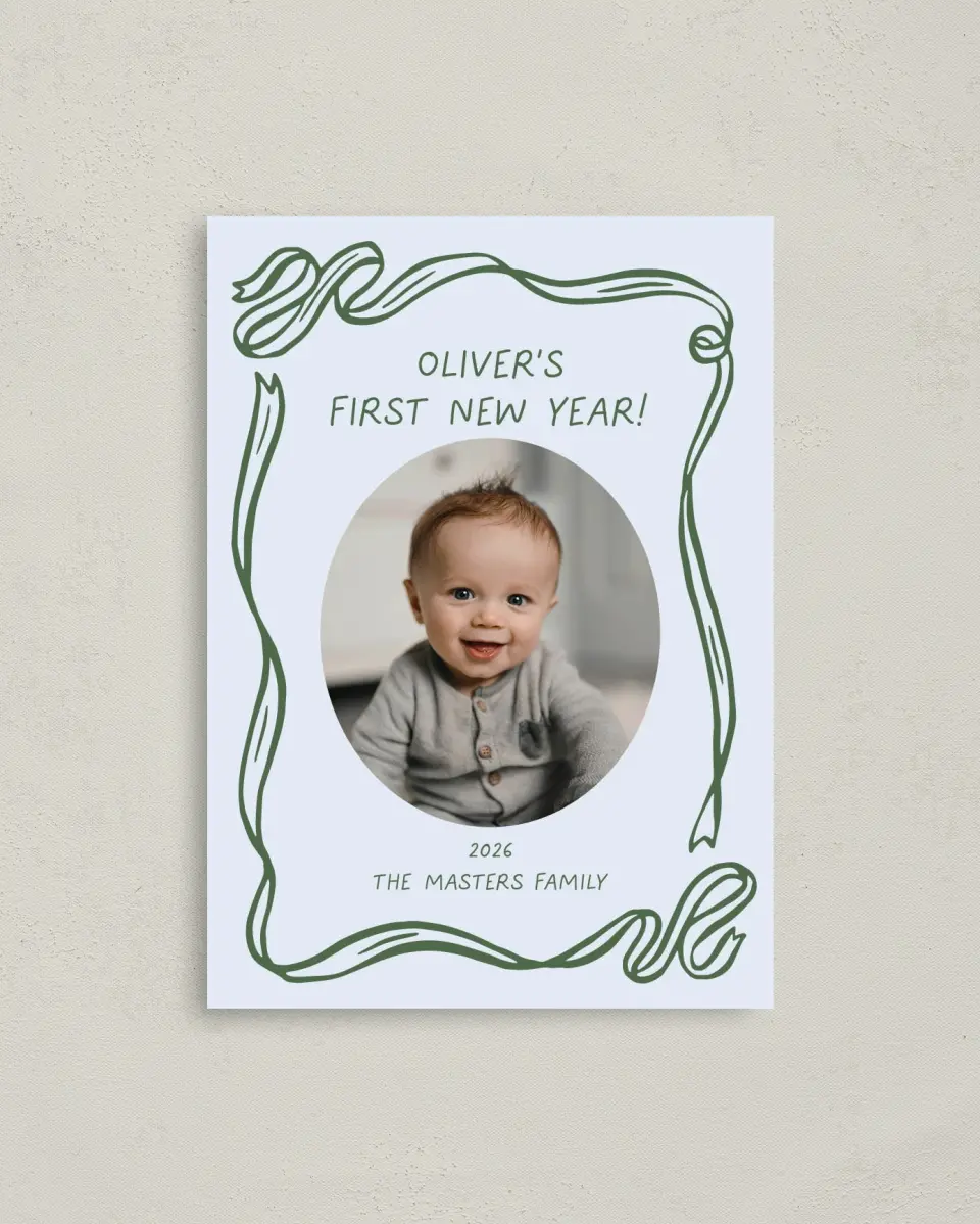 This is a 4" x 5.6" Christmas Card called Wrapped in Firsts printed in full color on Premium Smooth paper