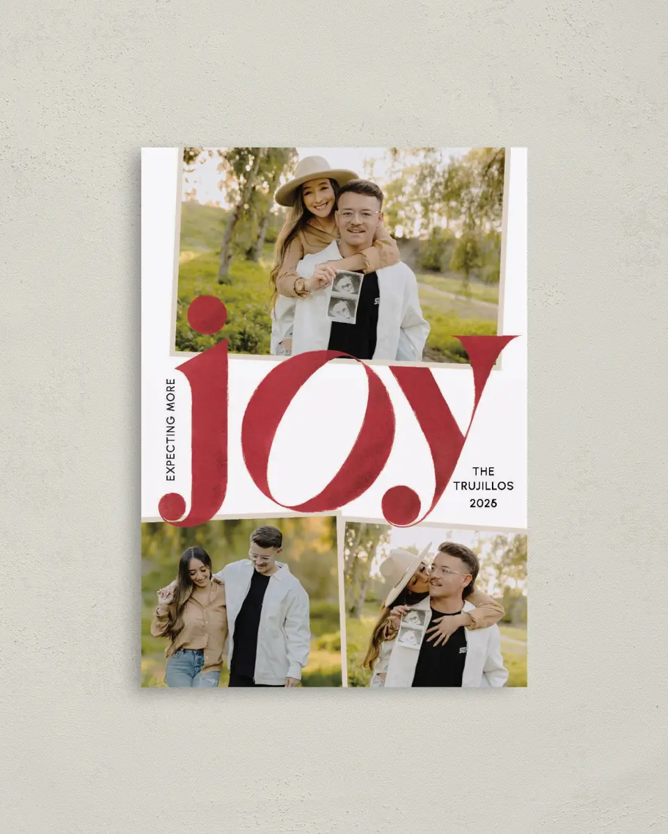 This is a 4" x 5.6" Christmas Card called Growing Joy printed in full color with Rose Gold foil on Soft Suede (coated) paper