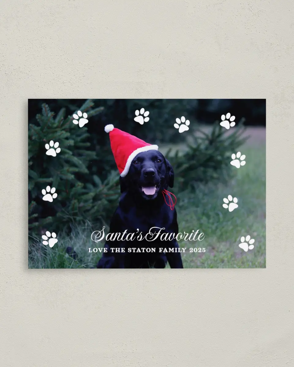 This is a 4" x 5.6" Christmas Card called Santa's Favorite printed in full color with Rose Gold foil on Soft Suede (coated) paper