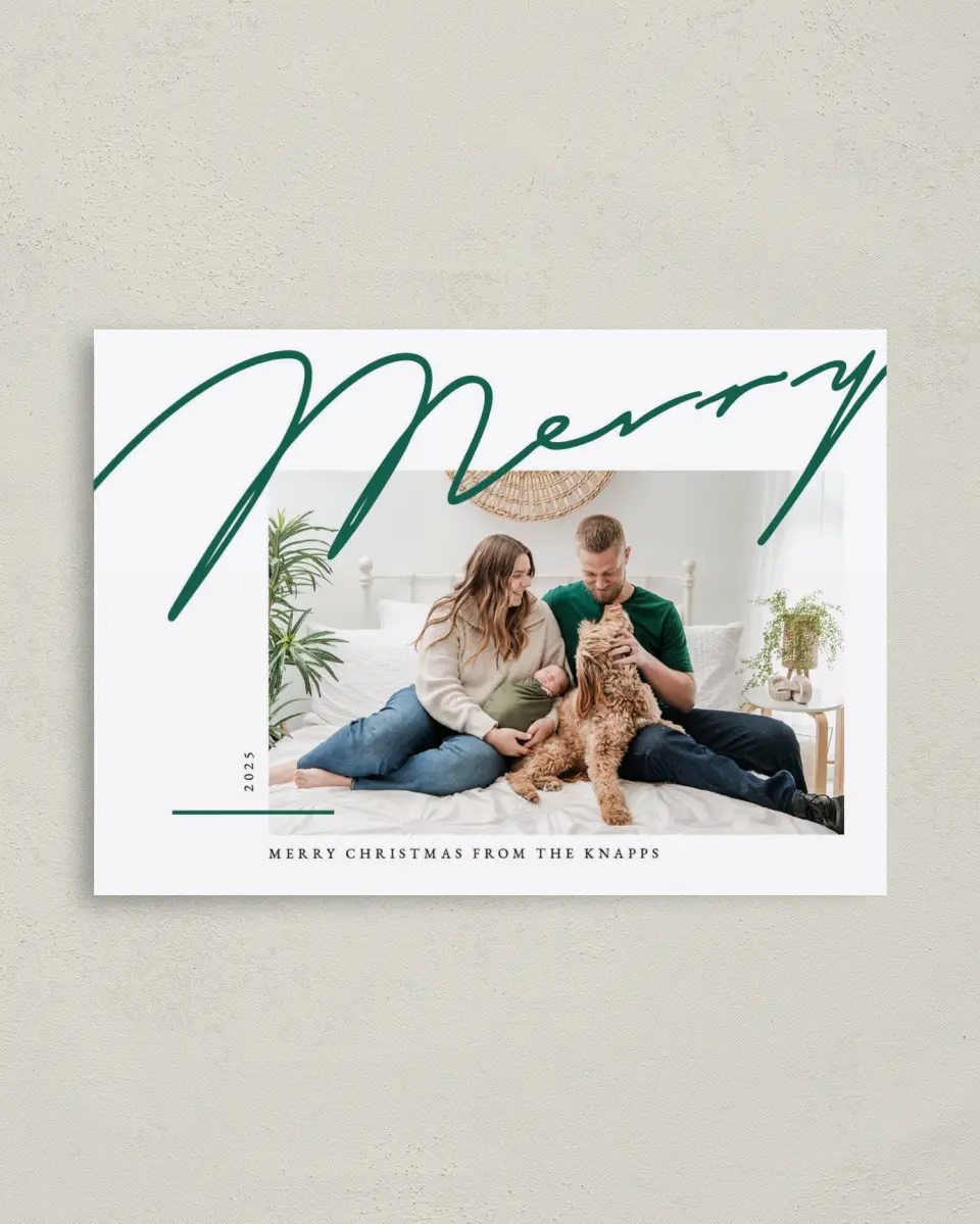 This is a 4" x 5.6" Christmas Card called Handwritten Merry printed in full color with Rose Gold foil on Soft Suede (coated) paper